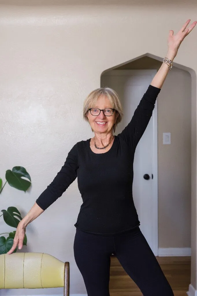 Kate Laub demonstrating a standing yoga pose
